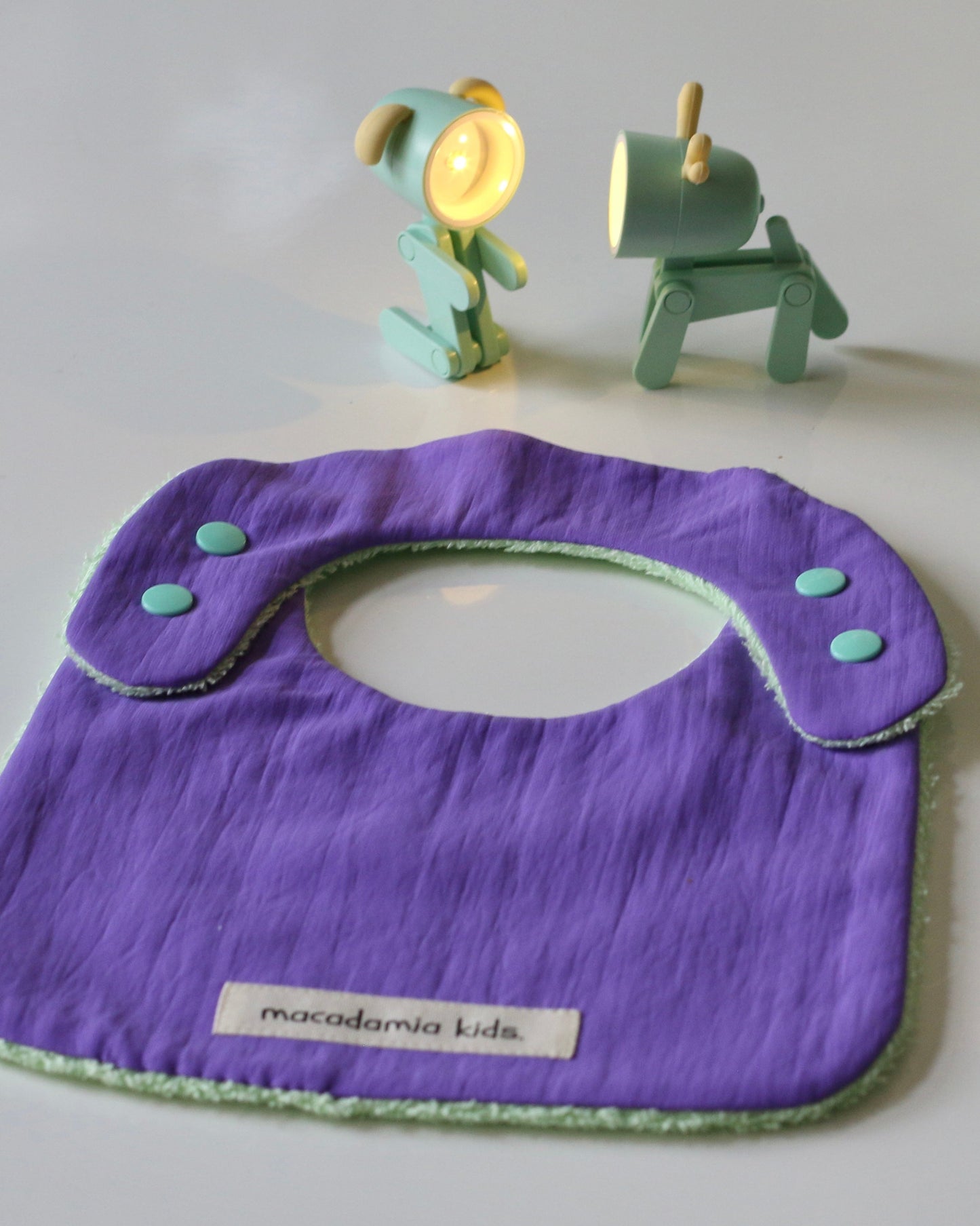 Reversible mint/lilac cotton terry bib