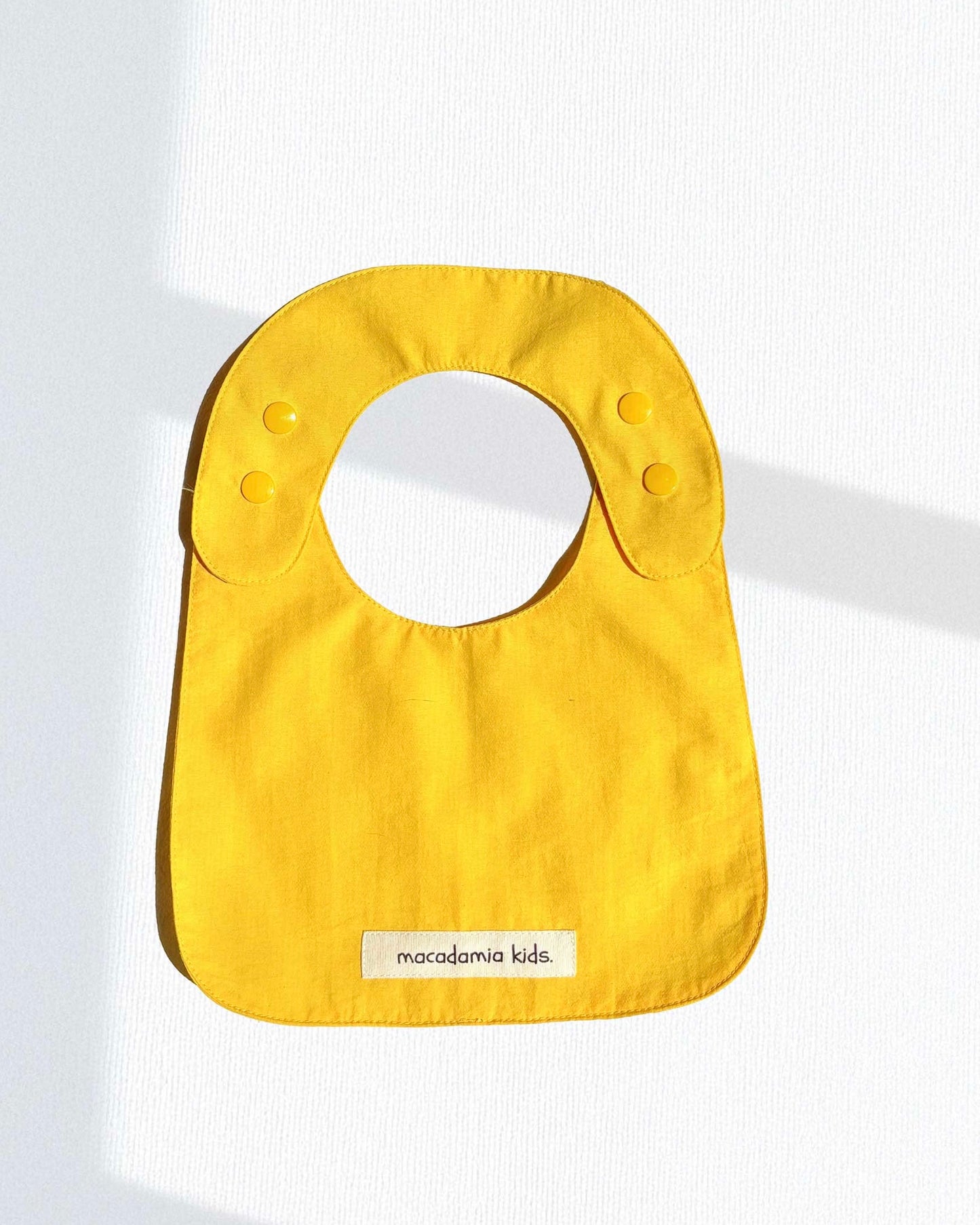 Reversible bib (available in 2 colors)