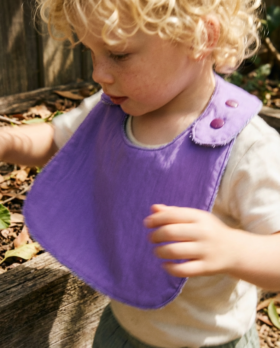 Babero reversible rizo lila/tejido técnico lila