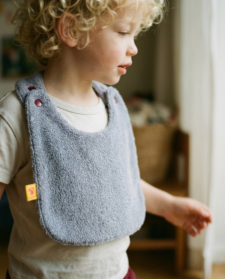 Babero reversible rizo lila/tejido técnico lila