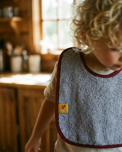 Babero LONDRES rizo lila