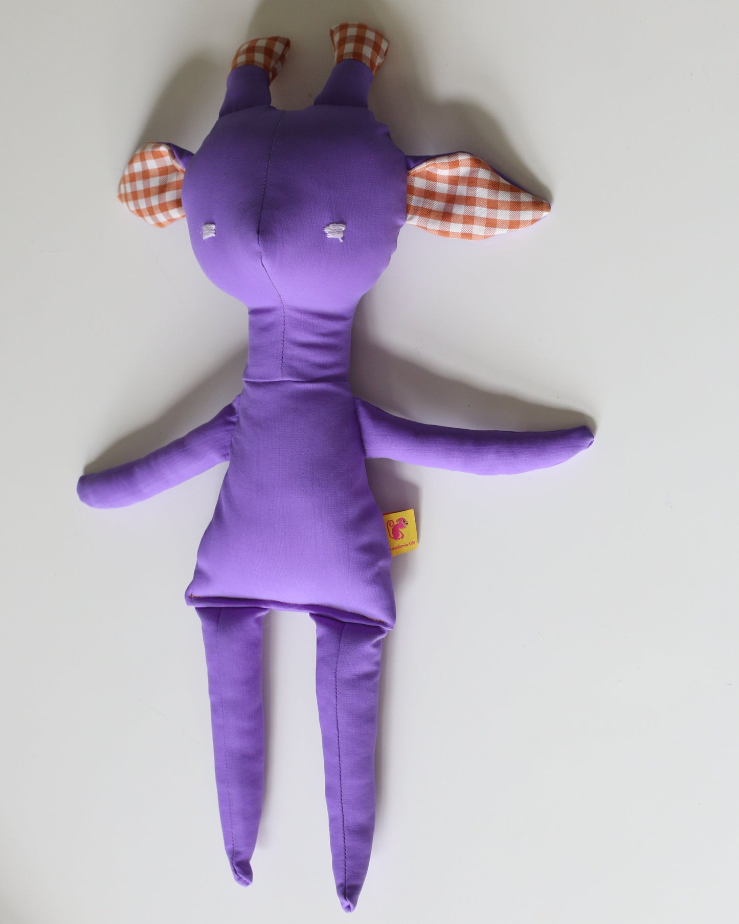 Theodora the Giraffe in lilac and large gingham