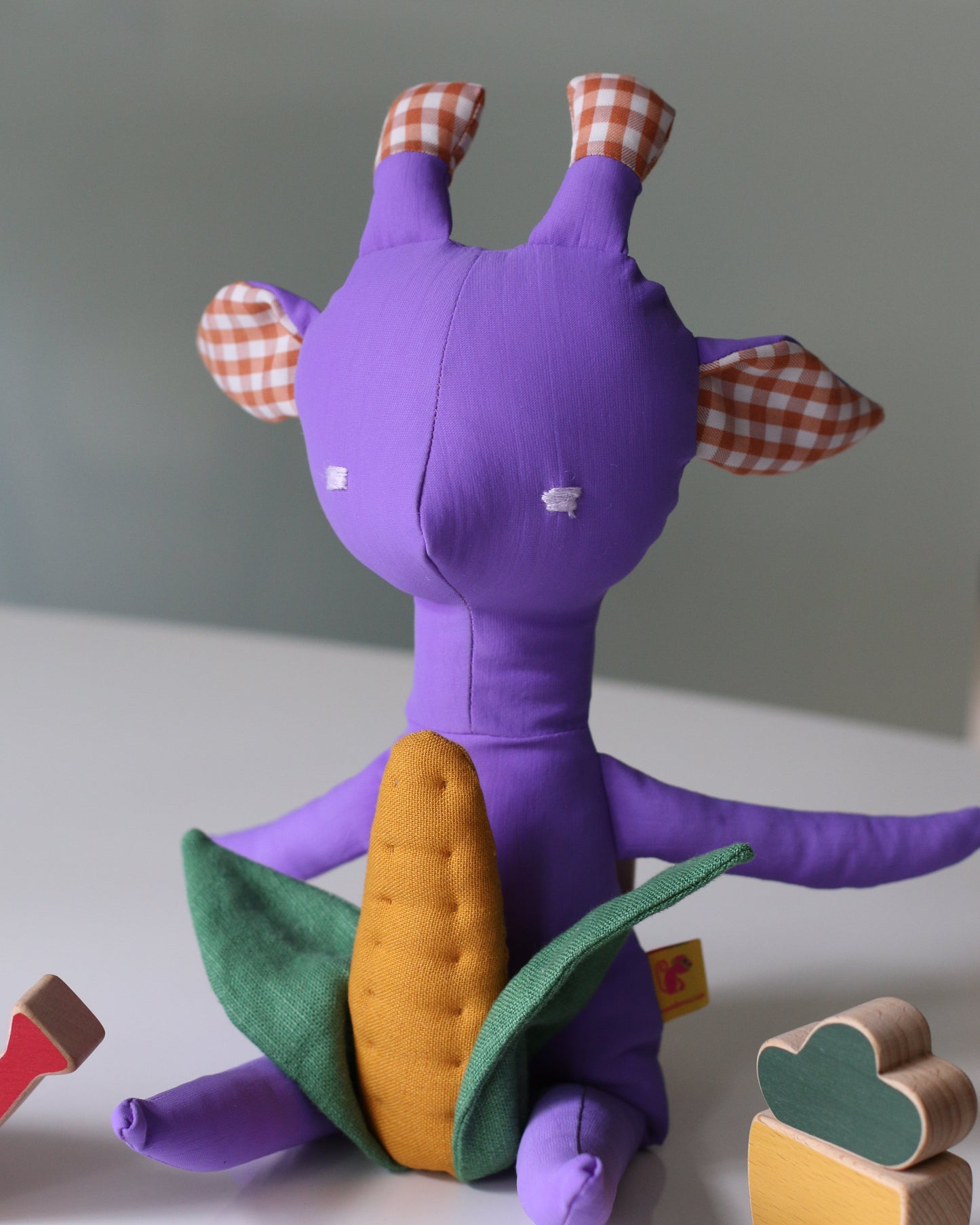 Theodora the Giraffe in lilac and large gingham