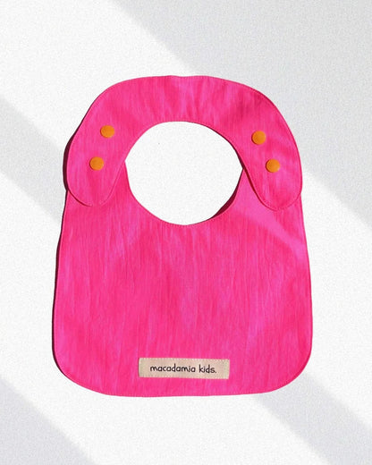 Pack de 2 baberos reversibles amarillo/fucsia