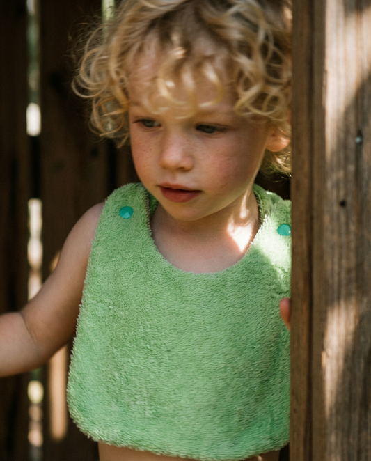 Babero reversible menta/lila rizo de algodón