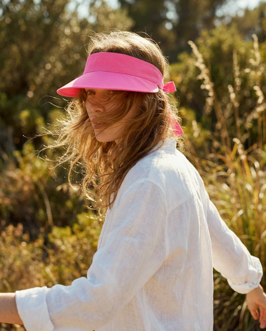 Visera con lazo trasero fúcsia