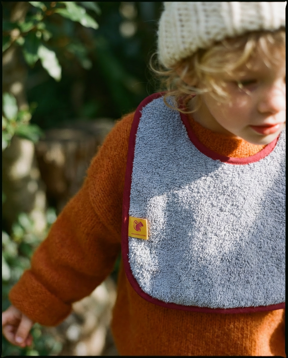 Babero LONDRES rizo lila