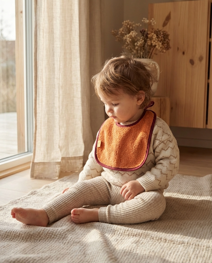 Babero LONDRES rizo taronja