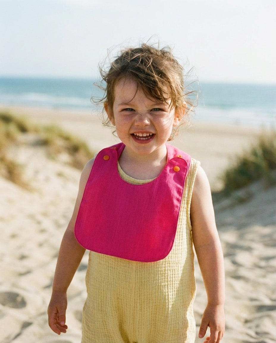 Reversible bib (available in 2 colors) 