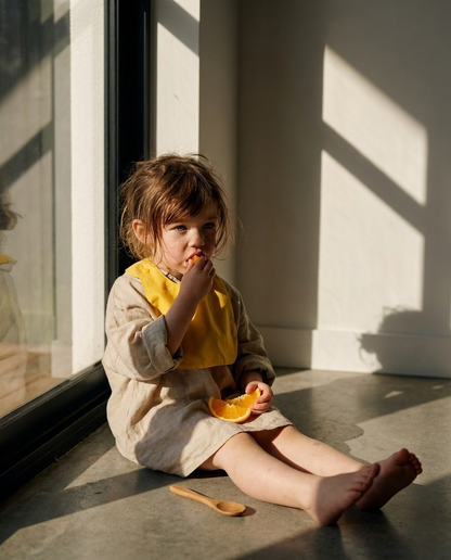 Reversible bib (available in 2 colors) 
